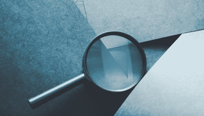 magnifying glass on blue background