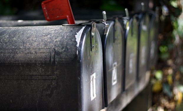 Mailbox with a letter inside.
