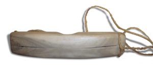 An example of Inuit goggles is shown to learn about the history of sunglasses.