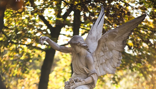 Angel tombstone in a cemetery. 